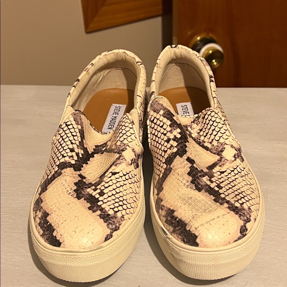 Steve Madden leather snake skin printed slip on sneakers. Brand new with tags.
